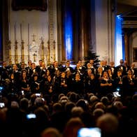 Christmas Carolling with the Glória LGBT+ Choir, Image of the Glória Choir performing