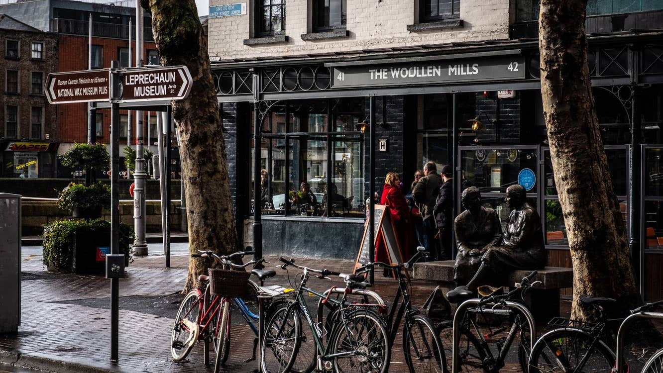 Exterior of a restaurant on a busy city street