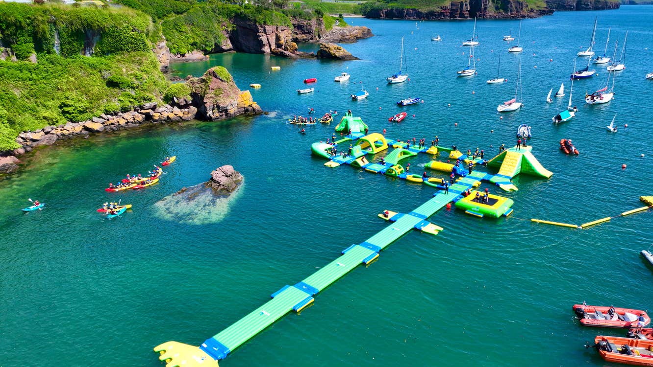 Dunmore East Adventure Centre Wipit Wipeout Aquapark and boats on the water