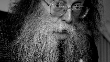 Eddie Lenihan Irish author, storyteller, lecturer , an older man pointing his finger with questioning expression