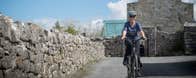 Woman on bike rented at e-whizz Kilfenora County Clare