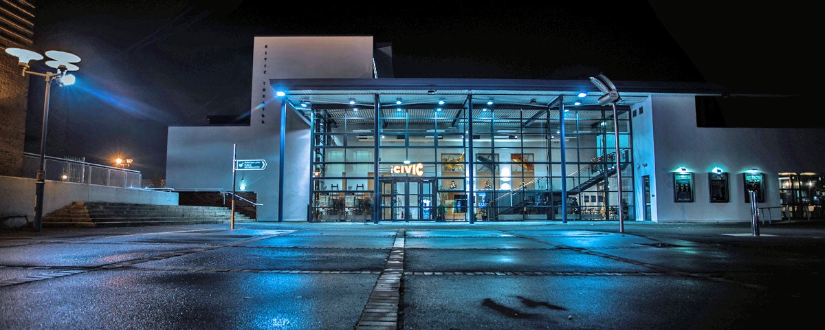 The exterior of the Civic Theatre at nightime