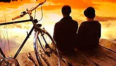 Two cyclists rest on the Kingfisher Cycle Trail