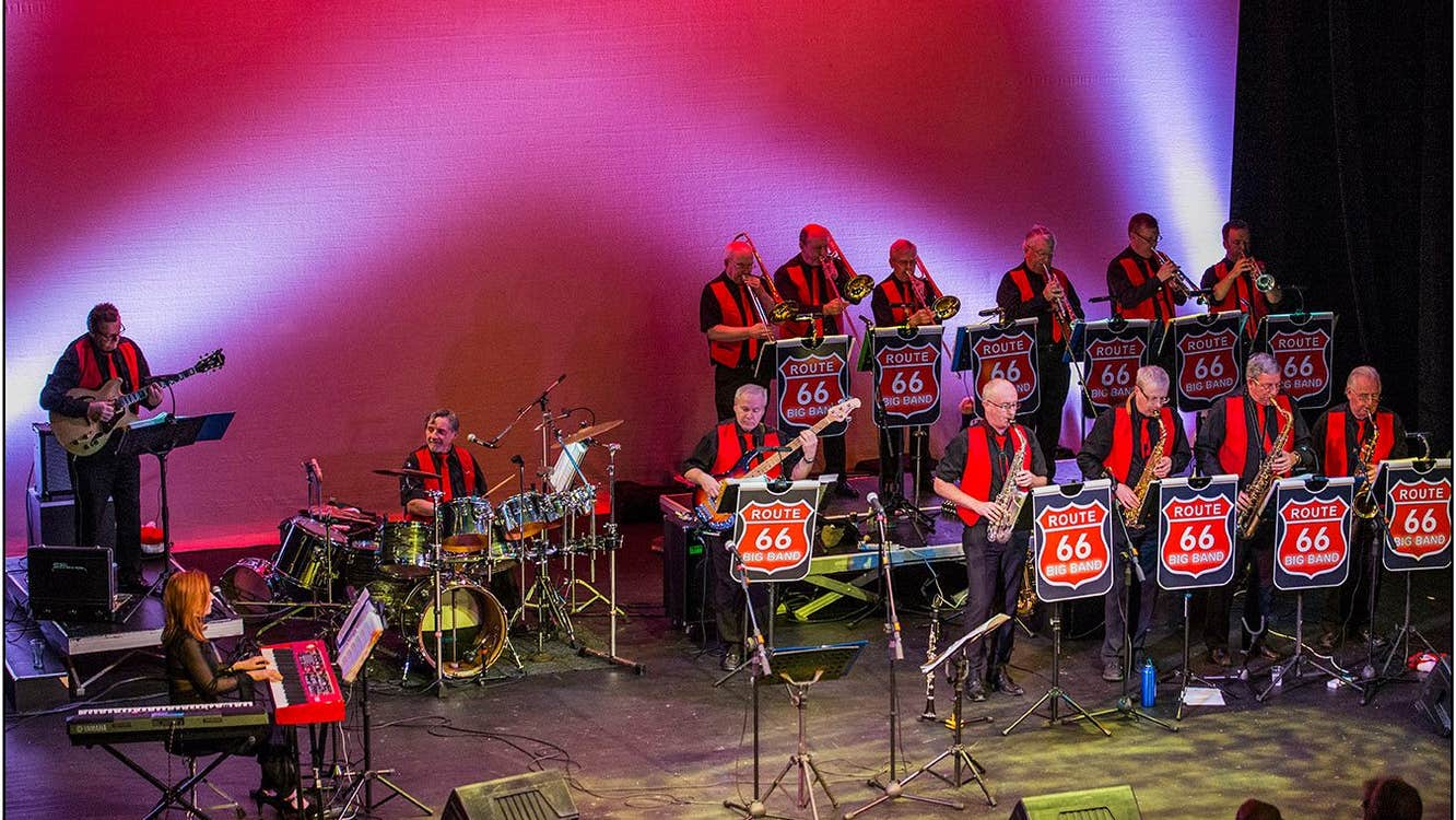 14 musicians fronted by a male and female singer playing music from all ages and genres.