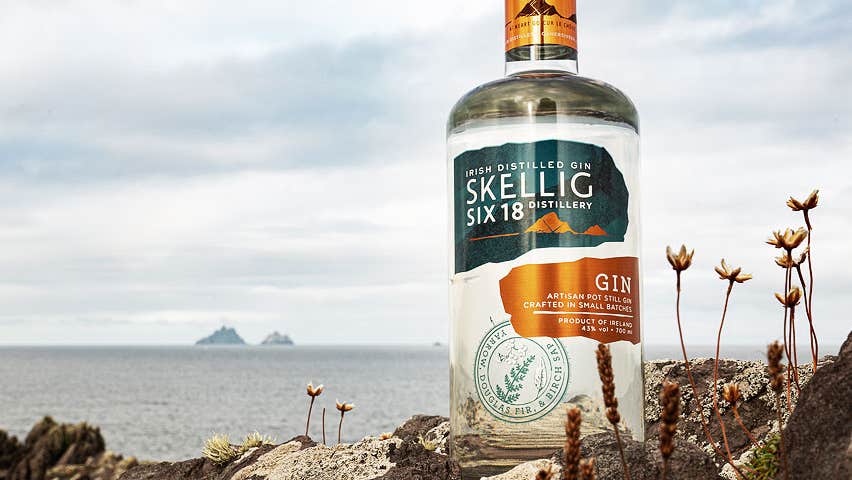 Skellig Six Eighteen Distillery Gin bottle with view of the Skellig Islands and the sea