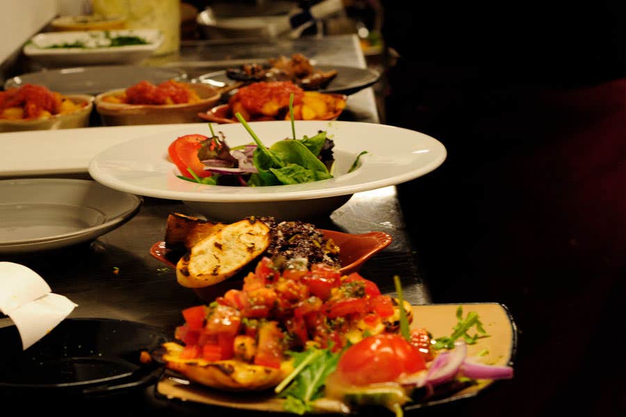 A selection of tapas bowls and salads ready for serving at The Grapevine Wine & Tapas Bar