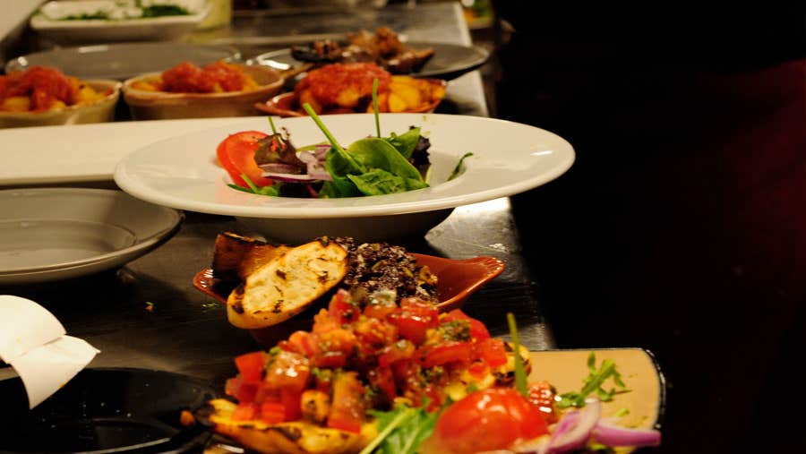 A selection of tapas bowls and salads ready for serving at The Grapevine Wine & Tapas Bar