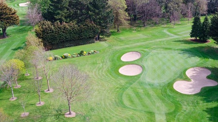 The fairways of Castle Golf Club with three sand dunes