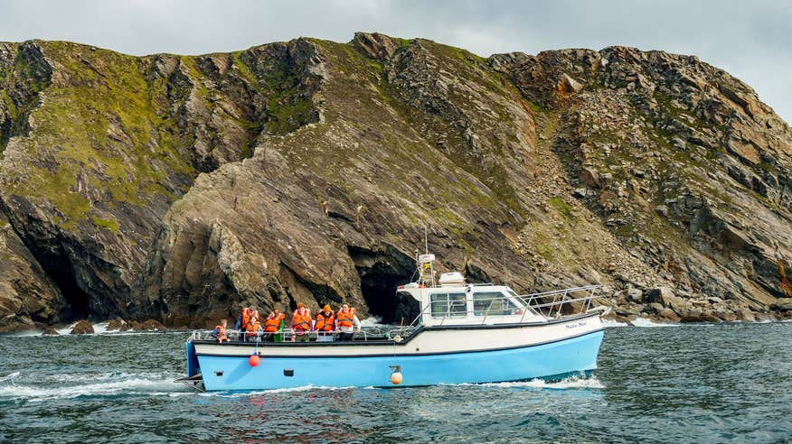 People on a boat tour of Sliabh Liag Cliffs in Co Donegal