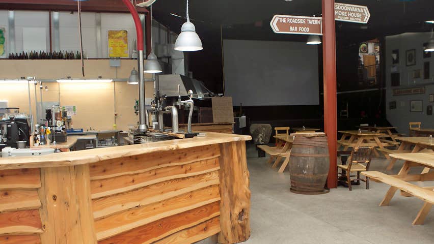 Interior view of bar with tables and benches