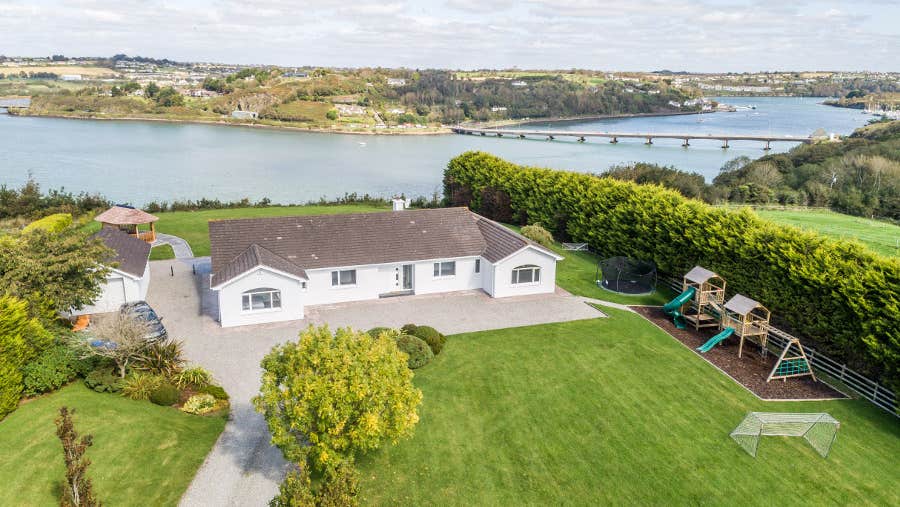 Front view of property over looking water