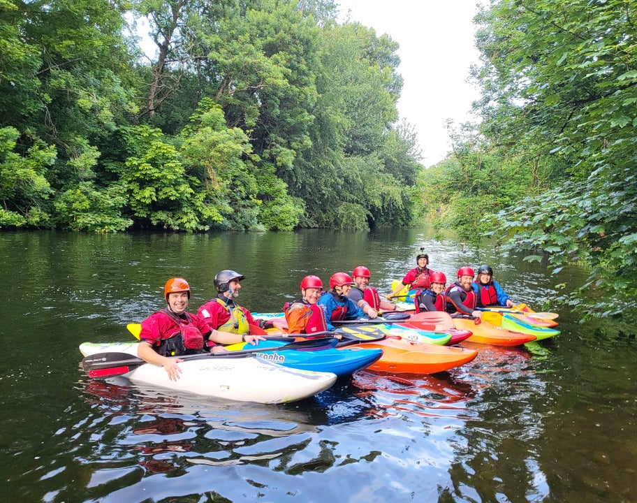 A group of kayaking course participants with Wild Water Kayak Club