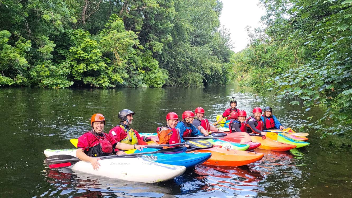 A group of kayaking course participants with Wild Water Kayak Club