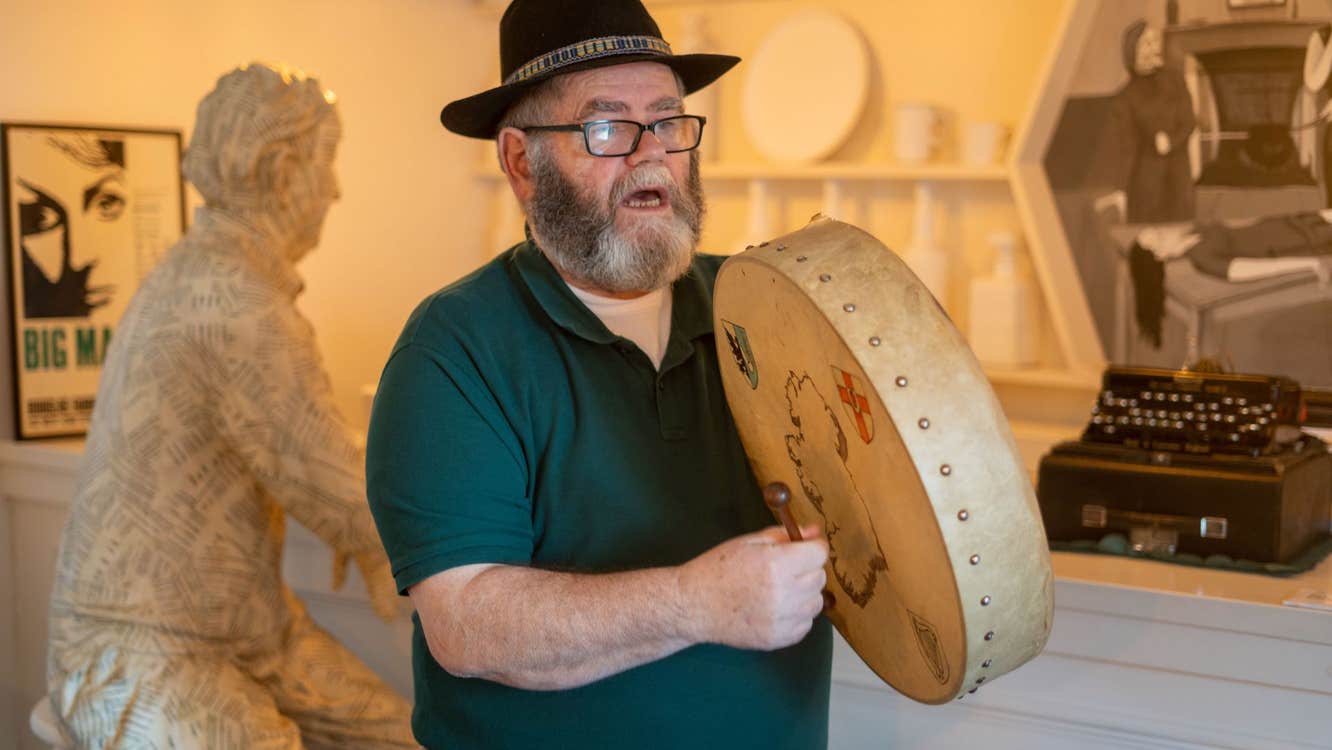 Vincent, performer guide at Kerry Writers' Musuem plays the bodhrán during a performance of 'Many Young Men of Twenty' by John B. Keane
