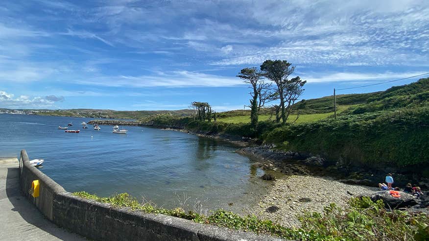 Clear waters and stone beach on Sherkin Island, County Cork