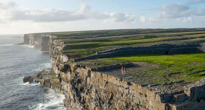 View of steep cliffs above the water at the Aran Islands