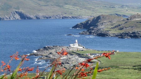 A view of a lighthouse taken from a distance