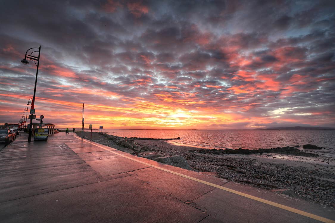 Salthill Promenade in Galway at sunset.