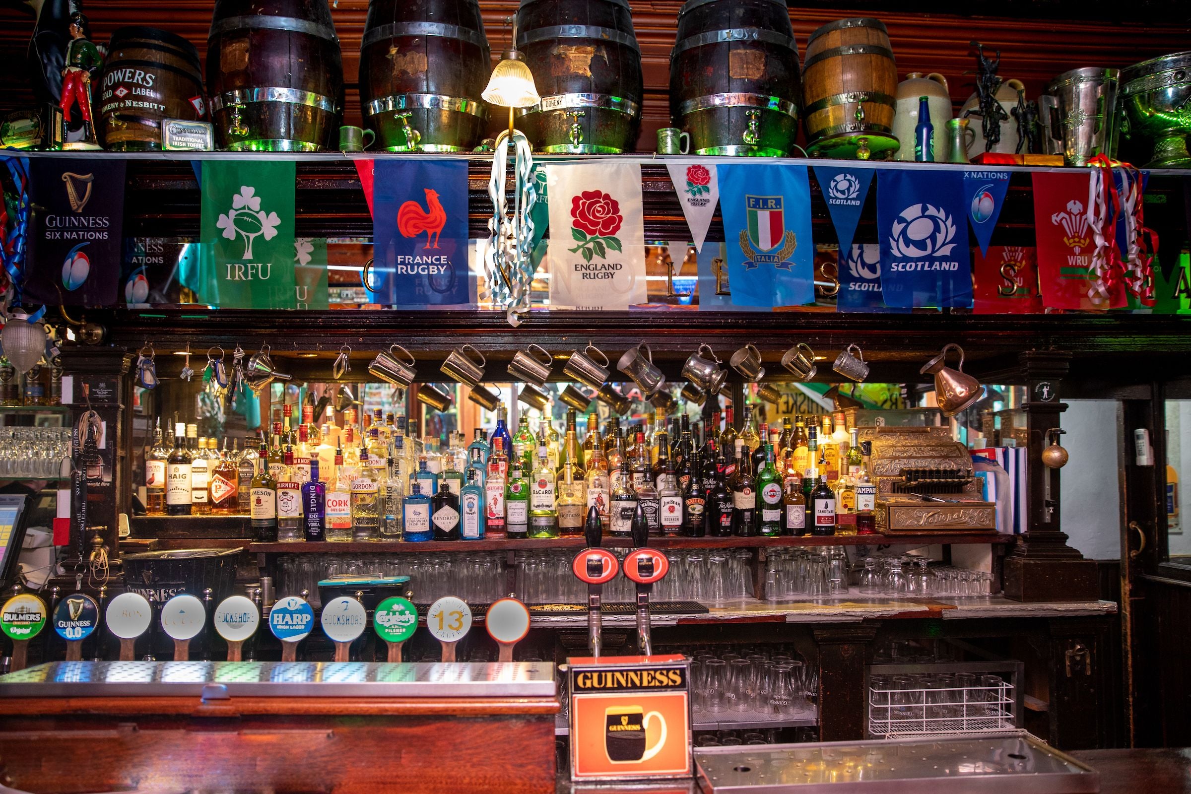 Different rugby flags hung above the bar in Doheny and Nesbitt.