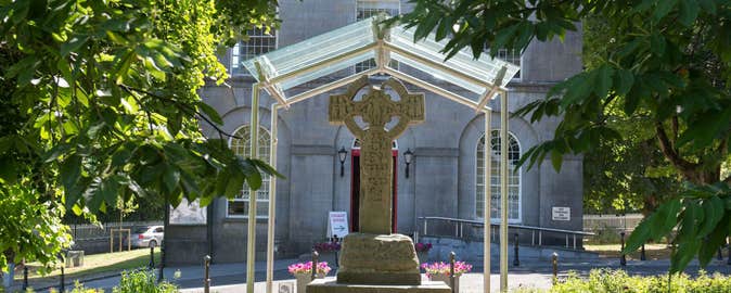 An ancient stone high cross outside Kells Courthouse
