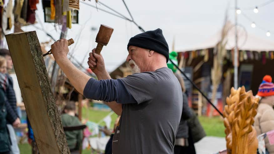 A woodturner at the 2024 Púca Festival in Trim, Co Meath