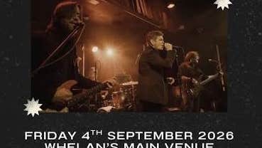 Dublin indie rock band Dakota 66, 3 men on a dark stage playing and singing