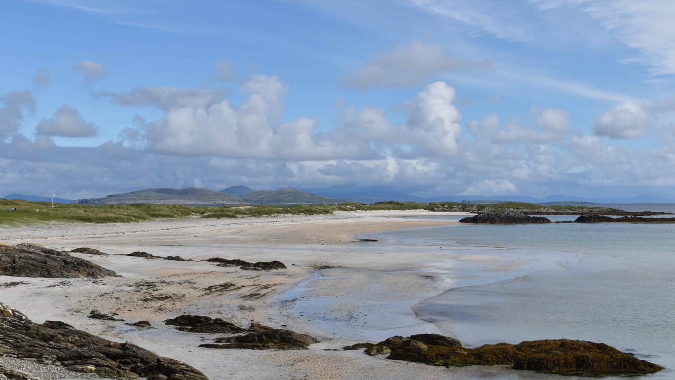 Seaside with blue sky and white clouds