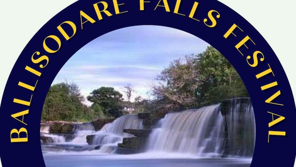 Part of circular image with yellow writing on dark blue border with inset photo of waterfalls over rocks.