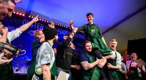 Irish National Oyster Opening Competition Winner, Stephen Nolan, being lifted in the air by his fellow competitors at The Galway International Oyster and Seafood Festival 2019