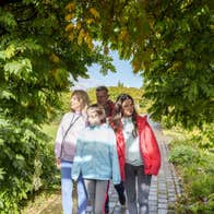 A family walking through Edgeworth Literary Trail