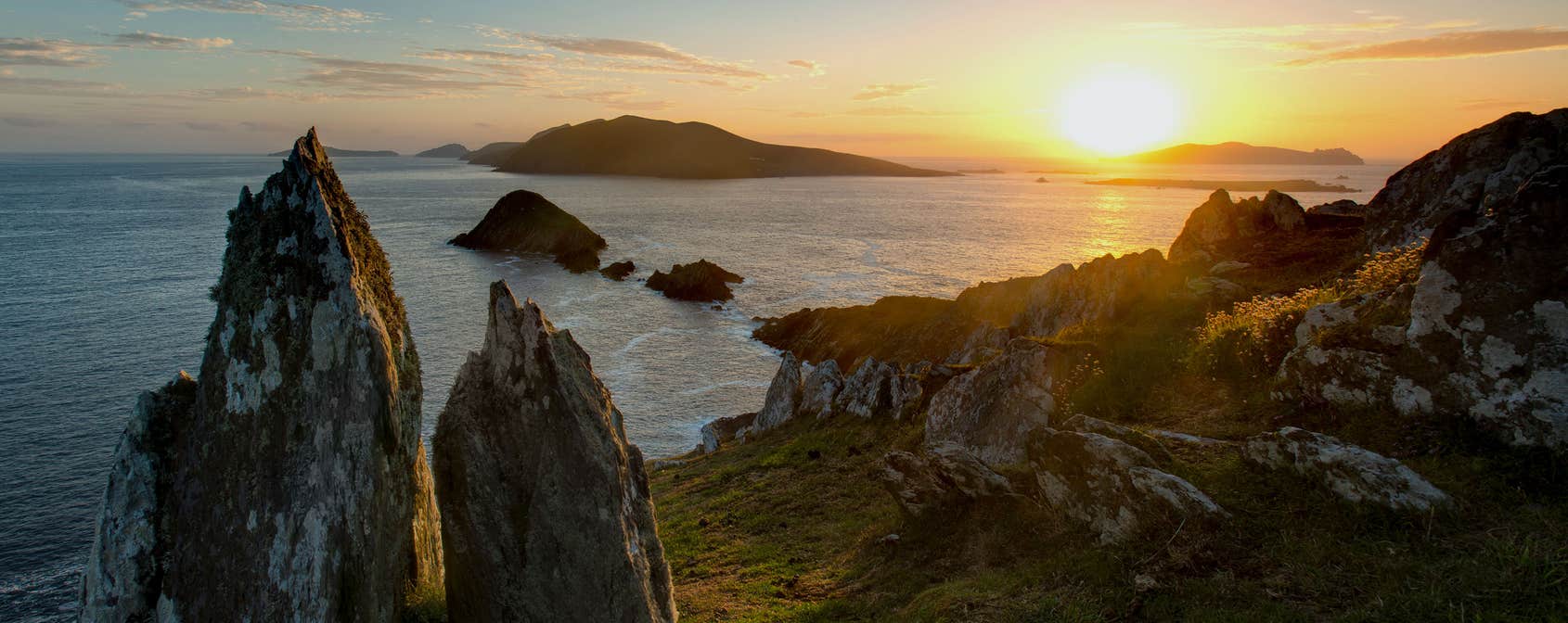 Sunset above the sea and coastline on the Dingle Peninsula, County Kerry