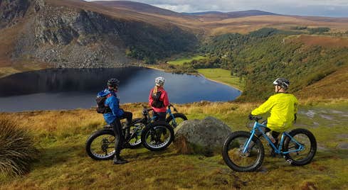 Image of people cycling in Lough Tay in County Wicklow
