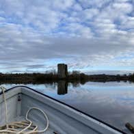 Views of Clough Oughter Castle on a boat tour with Adventure Legend