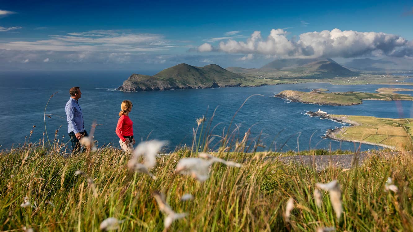 A couple walking on Geokaun Mountain on Valentia Island in County Kerry.