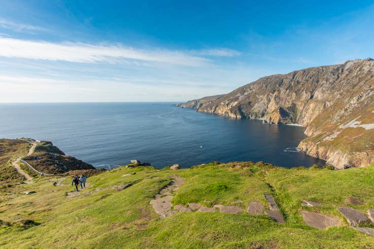 Hikers ascending Sliabh League in County Donegal