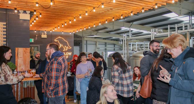 People enjoying a guided tour and beer tasting at Wicklow Wolf Brewery & Taproom