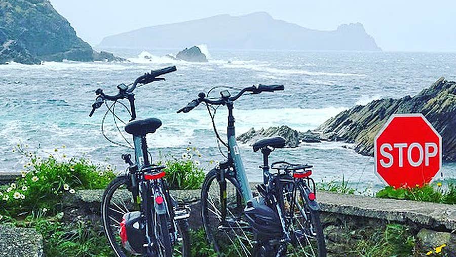 Dingle Electric Bike Experience view of crashing ocean waves and mountains