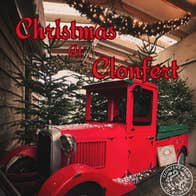 Picture of red truck with Christmas trees in the back