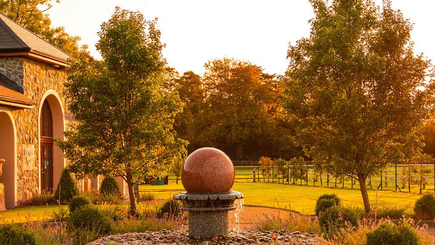 An exterior view of the Revas Spa at sunset
