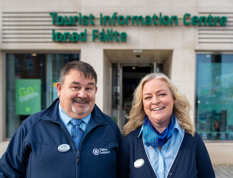 Staff from the Cork Tourist Information Centre standing outside the office
