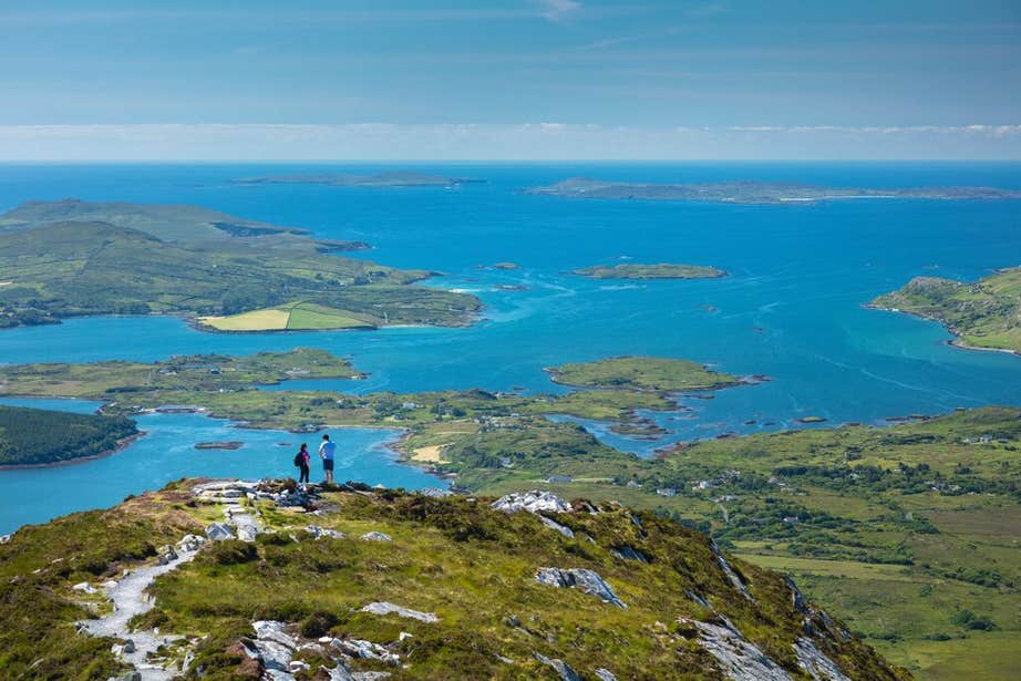 Walkers enjoying the view from the top of Diamond Hill in Connemara National Park