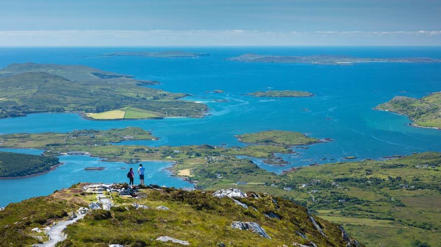 Walkers enjoying the view from the top of Diamond Hill in Connemara National Park