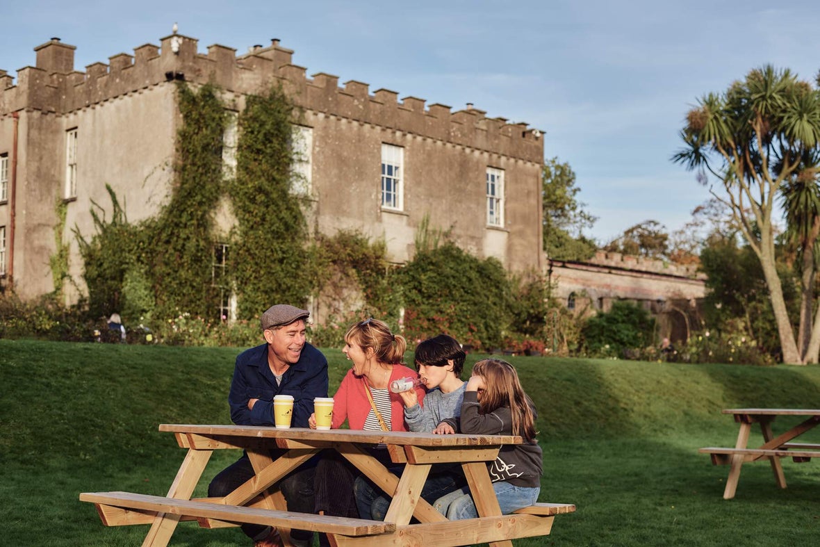 A family enjoying a picnic on the grounds of Ardgillan Castle in Balbriggan.