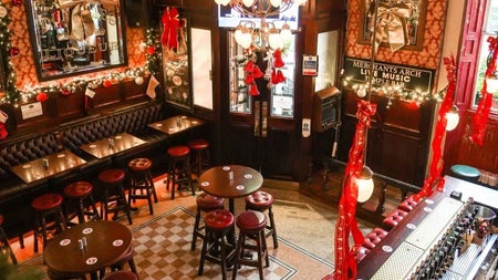 Interior of a bar with high stools and tables