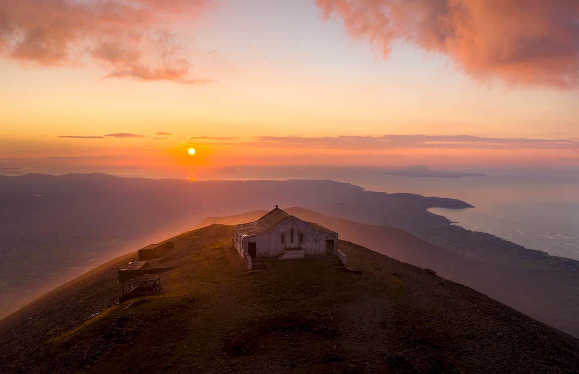 The summit of Croagh Patrick in Mayo at sunrise