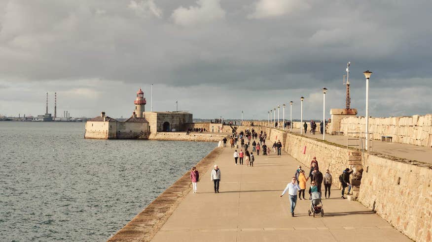 People walking along the Dun Laoghaire pier