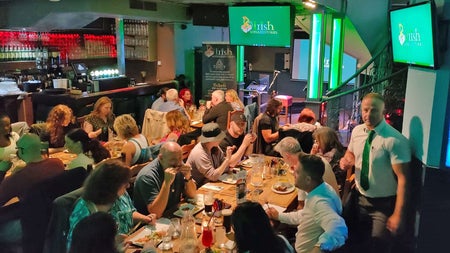 Irish Songs and Stories view of crowd enjoying food.