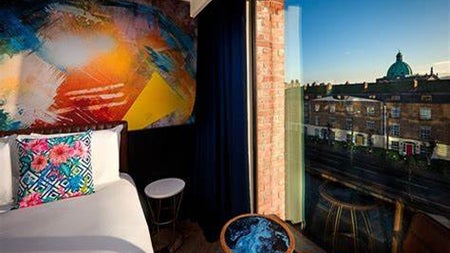 Bedroom with view of the city