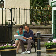 Image of a couple looking at a map in Enniskerry in County Wicklow