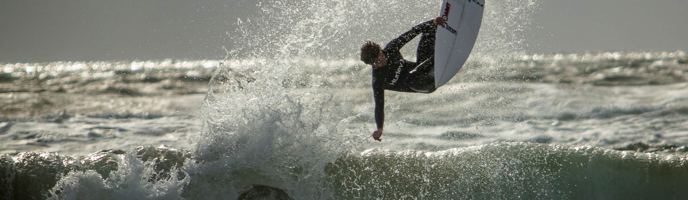 A surfer at Sea Sessions on Bundoran Beach in County Donegal